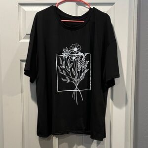 Black Graphic T-Shirt with Floral Design